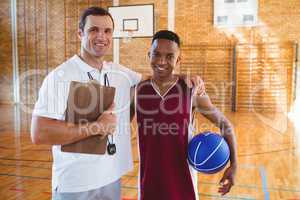 Portrait of smiling coach basketball player