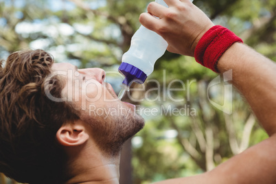 Close up of man drinking water