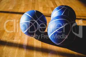 Hgh angle view of blue basketballs in court