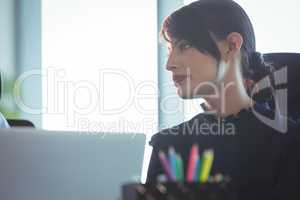 Young thoughtful woman looking away