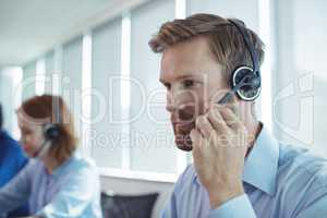 Close up of businessman using headset