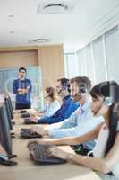 Supervisor with business team working at call center