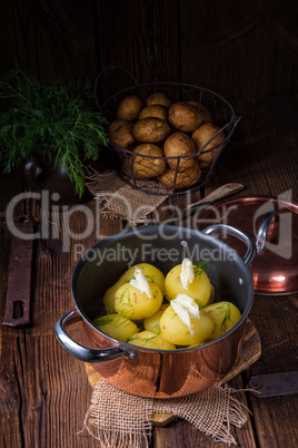 fresh boiled young potatoes with butter