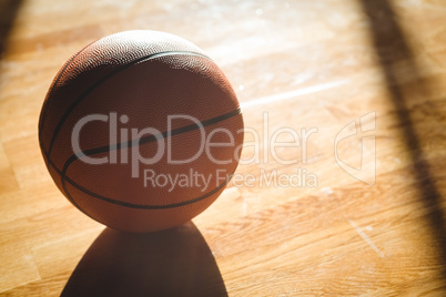 High angle view of orange basketball on floor