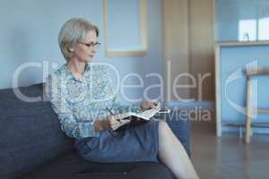 Businesswoman reading book