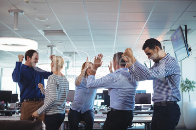 Cheerful business colleagues at office