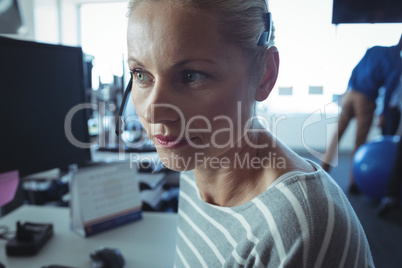 Thoughtful businesswoman at office desk