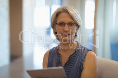 Portrait of businesswoman on sofa