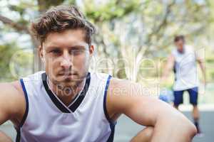 Portrait of confident male basketball player