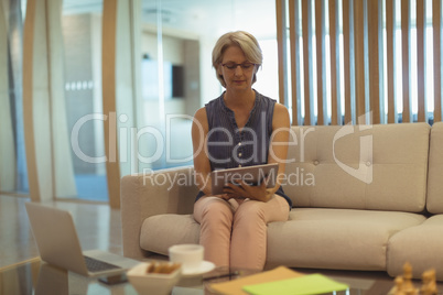 Businesswoman using tablet computer