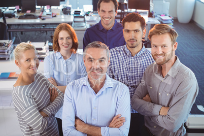 Portrait of business colleagues standing at office