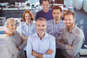 Portrait of business colleagues standing at office