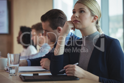 Thoughtful businesswoman at desk