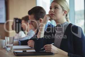 Thoughtful businesswoman at desk