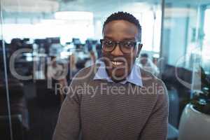 Portrait of smiling businessman wearing eyeglasses