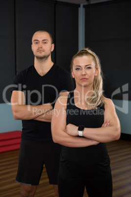 Portrait of friends standing at gym