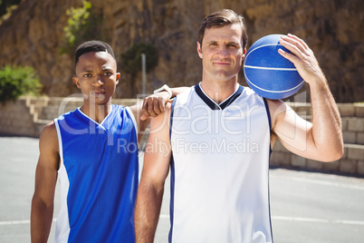 Portrait of male basketball players