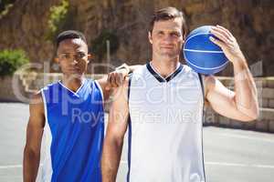 Portrait of male basketball players
