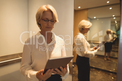 Businesswoman using digital tablet