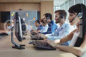 Business colleagues working at call center