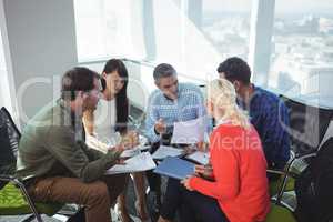 Business people discussing together at office