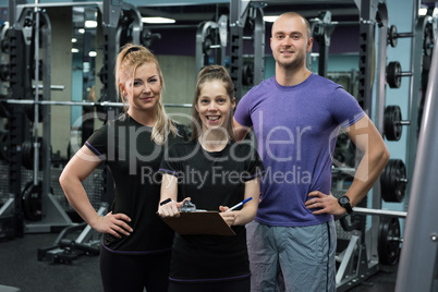 Portrait of smiling friends standing together