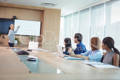 Business colleagues at conference table during meeting