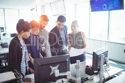 Young entrepreneurs discussing together at office