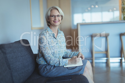 Portrait of smiling businesswoman