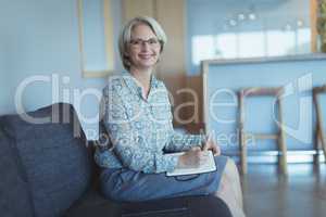 Portrait of smiling businesswoman