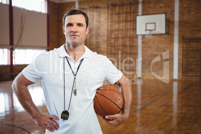 Portrait of confident basketball coach