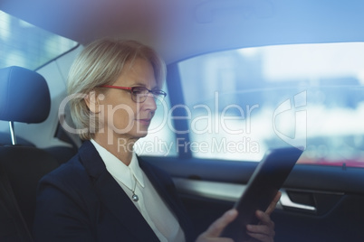 Businesswoman using tablet computer