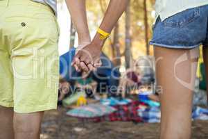 Close up of couple holding hands