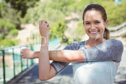 Portrait of smiling woman exercising