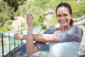 Portrait of smiling woman exercising