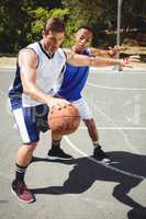 Player practicing basketball