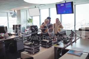 Business people working together at desk