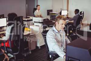 Business colleagues working at desk