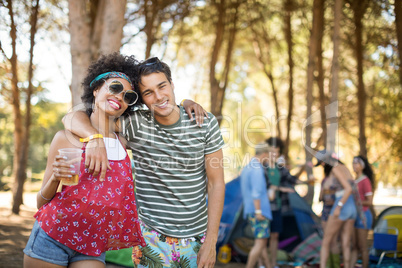 Portrait of smiling young friends standing together