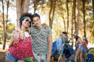 Portrait of smiling young friends standing together