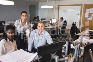 Portrait of business colleagues working at office