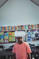 Boy with virtual reality simulator