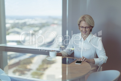 Businesswoman using smart phone