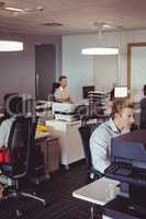 Business colleagues working at modern office