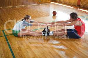 Side view of basketball player exercising