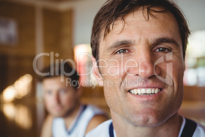 Close up portrait of smiling basketball player