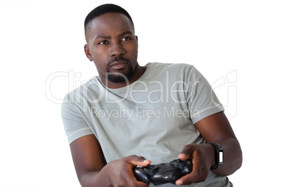 Man playing video game against white background