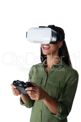 Woman playing video game with virtual reality headset