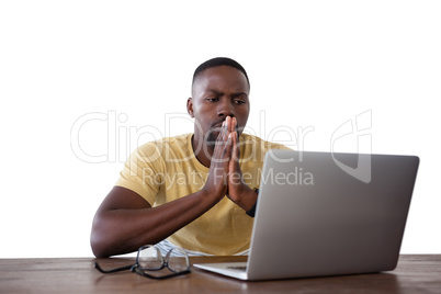 Man using laptop against white background