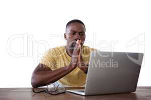 Man using laptop against white background